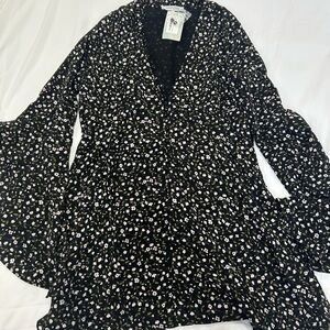 Floral patterned dress with bell sleaves